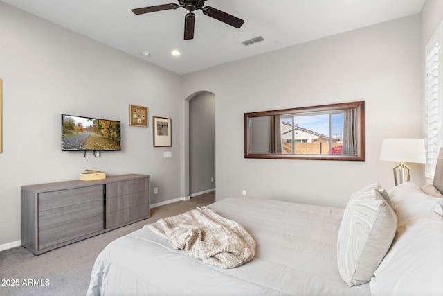 carpeted bedroom with ceiling fan