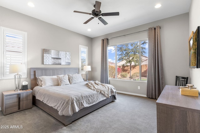 carpeted bedroom with ceiling fan