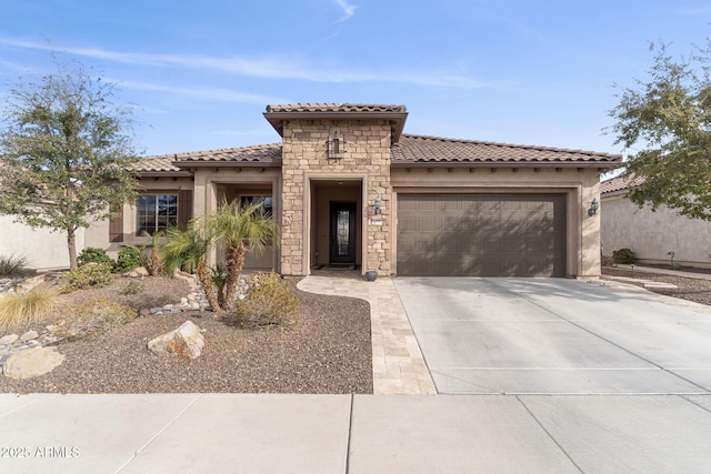 mediterranean / spanish house featuring a garage