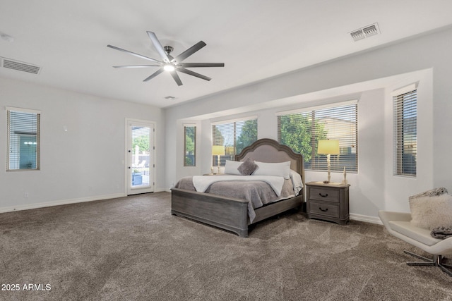 bedroom with carpet flooring, access to outside, and visible vents