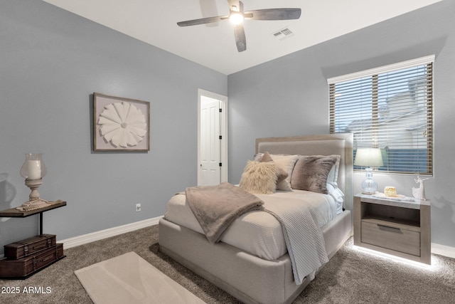 bedroom with a ceiling fan, baseboards, visible vents, and carpet