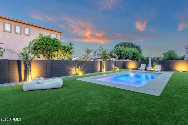 view of swimming pool with a fenced backyard, a fenced in pool, and a lawn