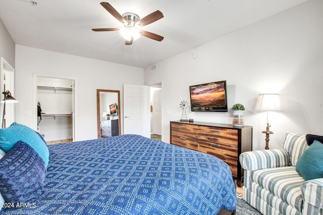 bedroom with ceiling fan, a closet, and visible vents