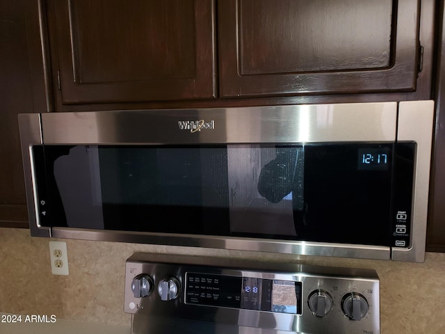 room details featuring dark brown cabinetry and stainless steel appliances