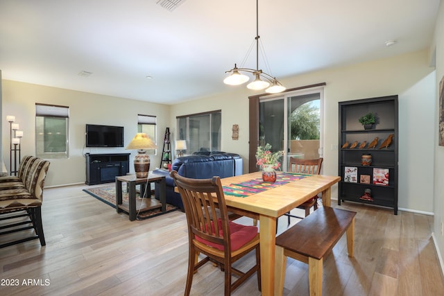 dining space featuring light hardwood / wood-style flooring