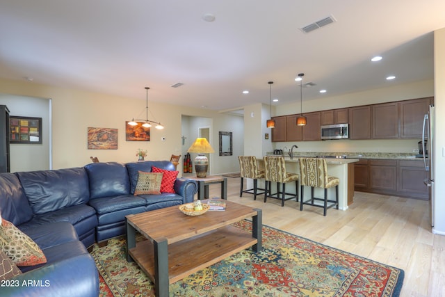 living room featuring light hardwood / wood-style flooring