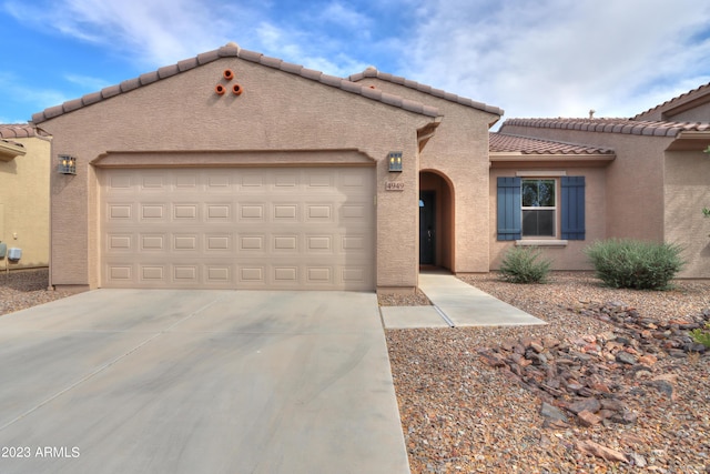 view of front of property featuring a garage