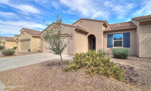 view of front of home with a garage