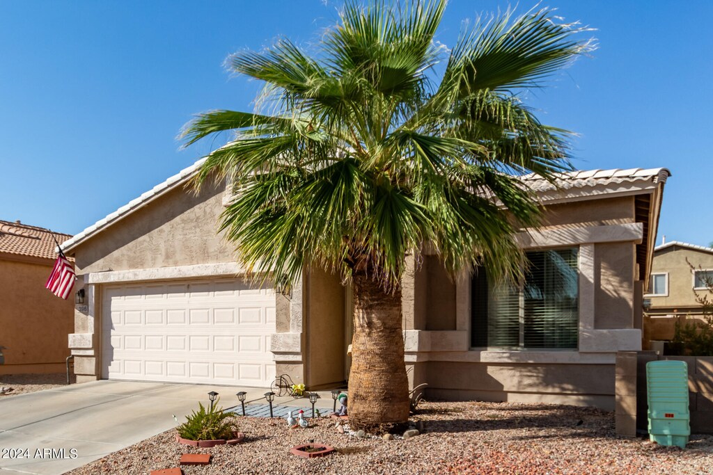 view of front of home with a garage