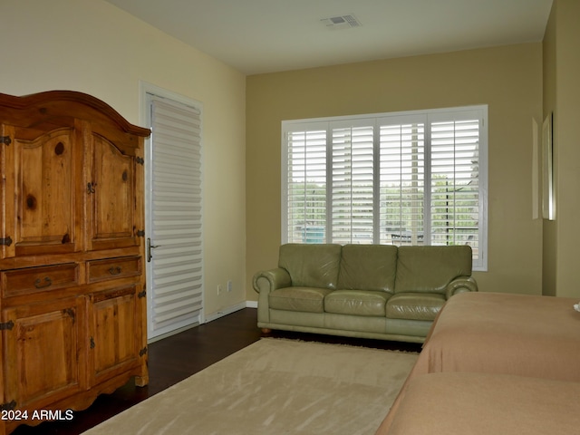 living room featuring dark hardwood / wood-style flooring