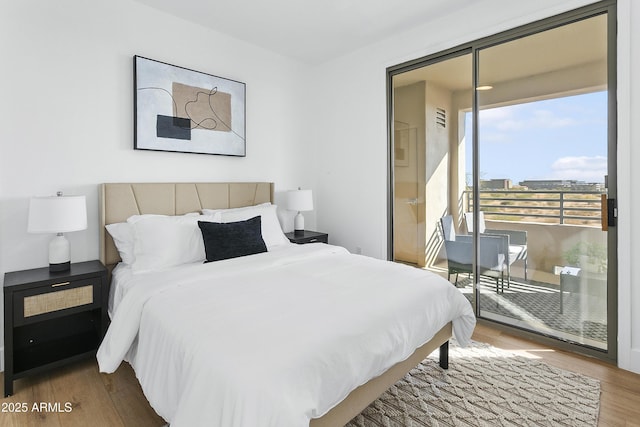 bedroom featuring wood-type flooring