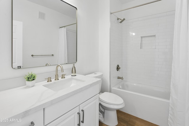 full bathroom featuring vanity, toilet, and shower / bathtub combination with curtain