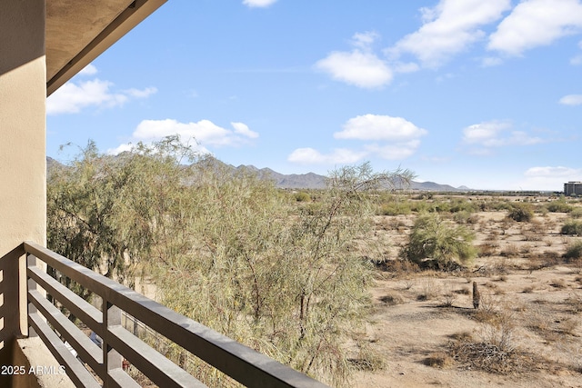 balcony featuring a mountain view