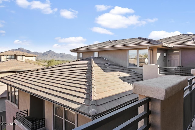 wooden terrace featuring a mountain view