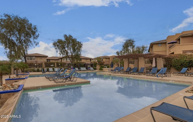 view of swimming pool featuring a patio