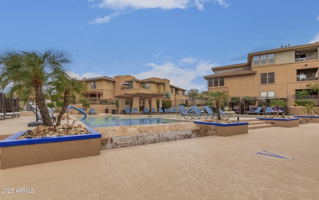 view of pool with a patio