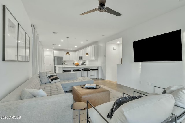 living room with ceiling fan