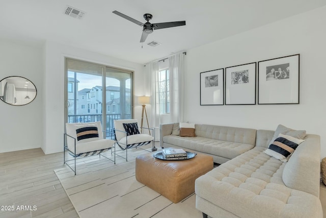 living room with ceiling fan