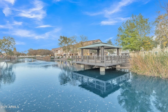 dock area featuring a gazebo and a water view