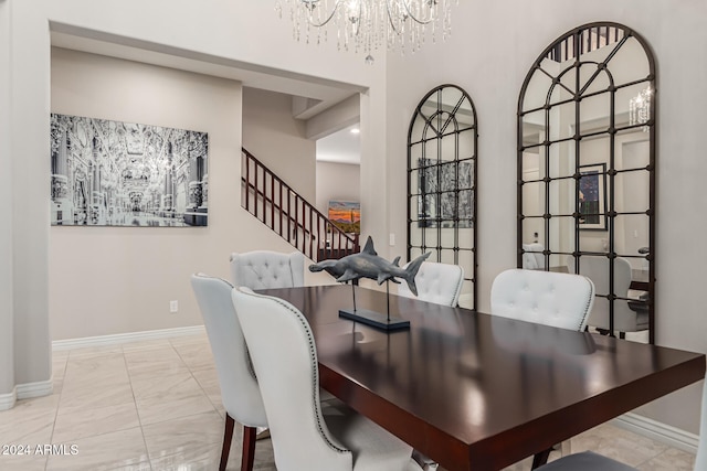 dining space with an inviting chandelier