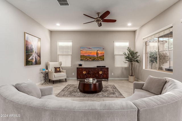 living room featuring ceiling fan