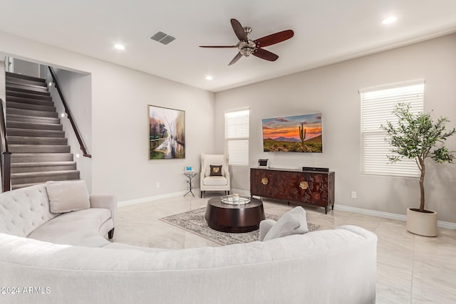 living room featuring ceiling fan