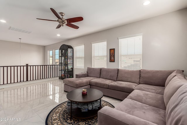 living room with ceiling fan