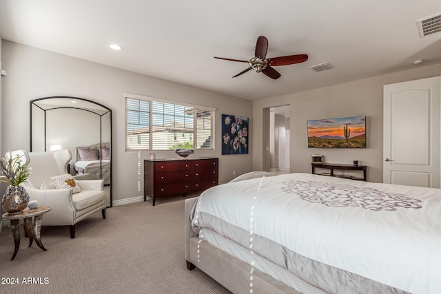 carpeted bedroom featuring ceiling fan