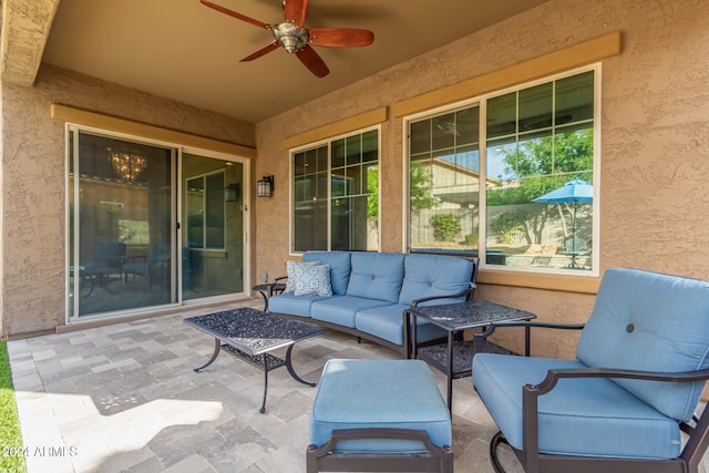 view of patio / terrace with ceiling fan and an outdoor hangout area