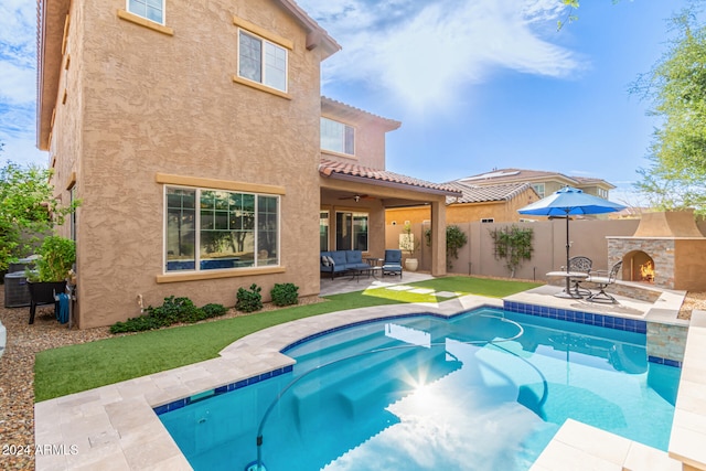 view of swimming pool with a patio and an outdoor hangout area