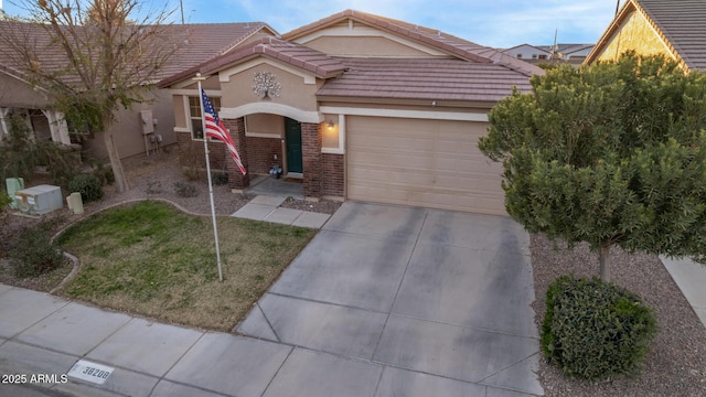 view of front facade featuring a garage and a front yard