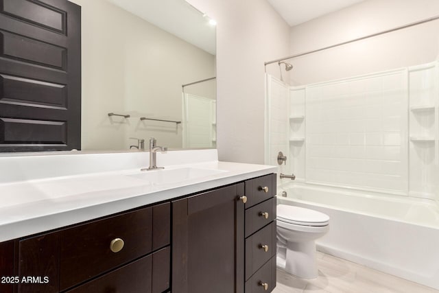 full bathroom with vanity, shower / bathtub combination, and toilet