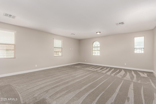 empty room featuring carpet floors