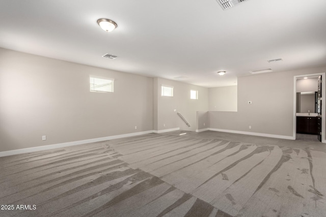 interior space featuring light colored carpet