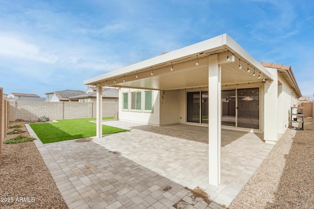 rear view of house with a patio area