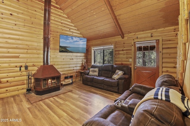 living room featuring a wood stove, rustic walls, wood ceiling, and light hardwood / wood-style flooring