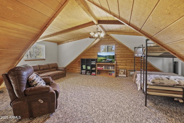 bedroom featuring multiple windows, wood ceiling, wooden walls, and vaulted ceiling