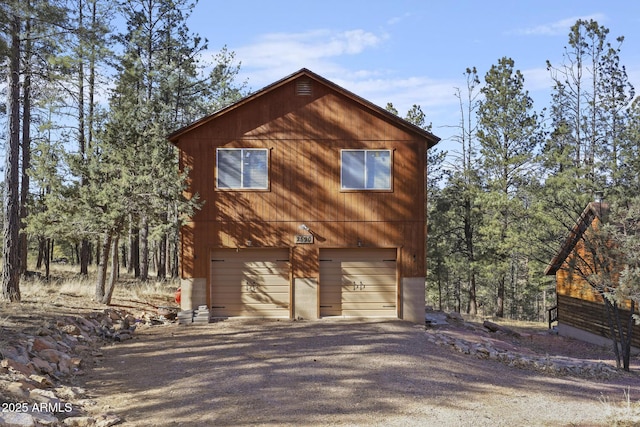 view of home's exterior with a garage