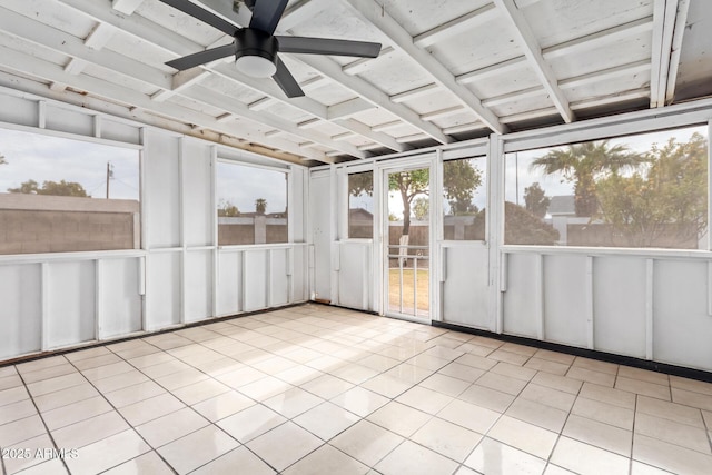 unfurnished sunroom featuring ceiling fan