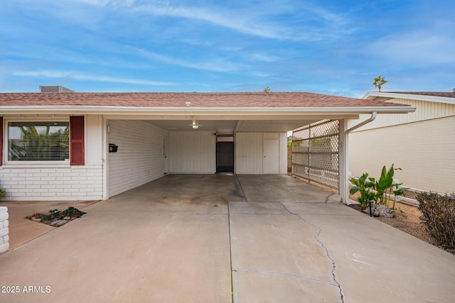 exterior space with a carport