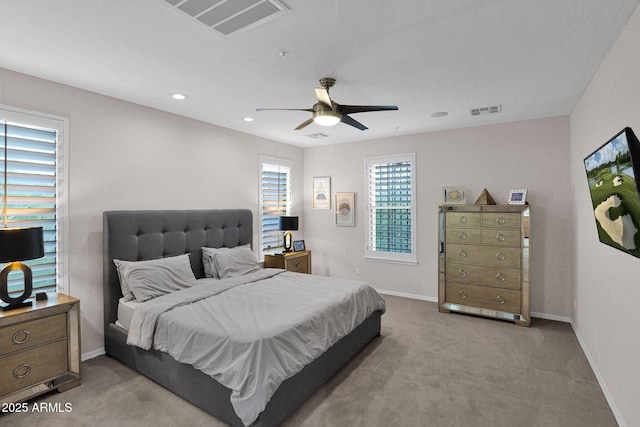 carpeted bedroom with ceiling fan