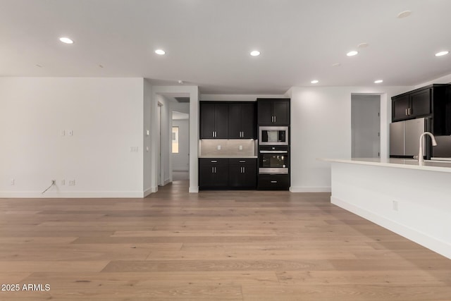 19338 S 212th Pl, Queen Creek, AZ 85142 - unfurnished living room with light wood finished floors and recessed lighting