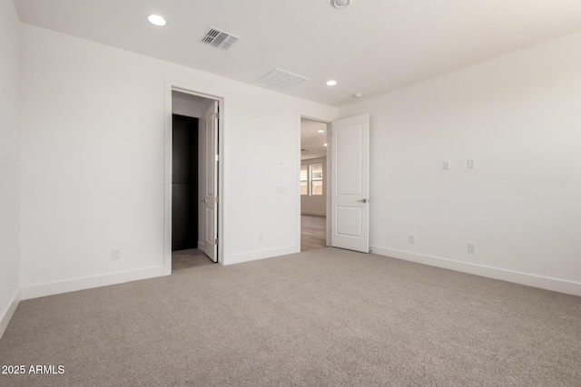 19338 S 212th Pl, Queen Creek, AZ 85142 - unfurnished bedroom with recessed lighting, light carpet, and a walk in closet