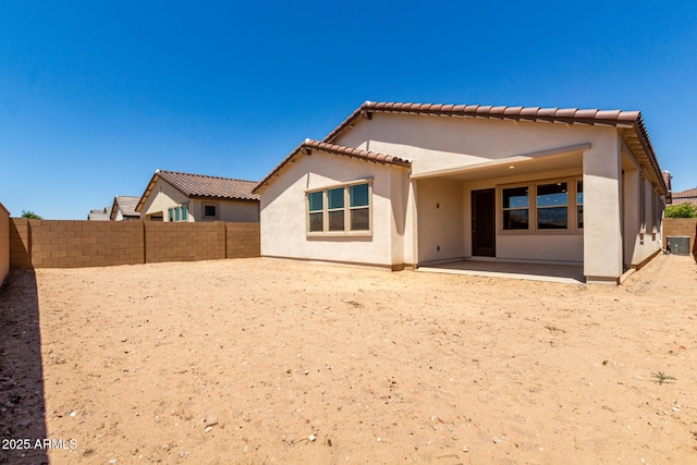 19338 S 212th Pl, Queen Creek, AZ 85142 - back of property with a fenced backyard, stucco siding, a patio area, and a tiled roof