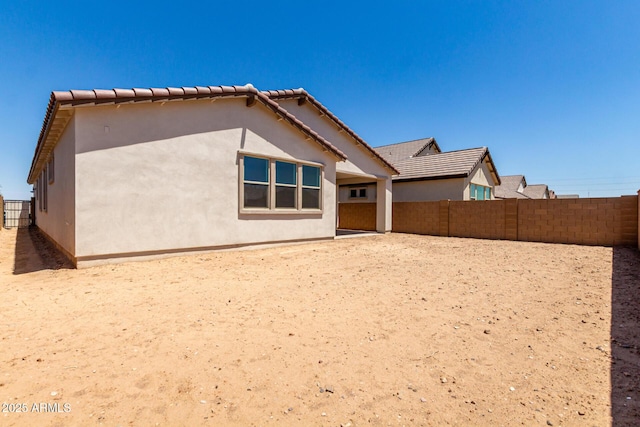 19338 S 212th Pl, Queen Creek, AZ 85142 - rear view of property with stucco siding, a fenced backyard, and a tiled roof