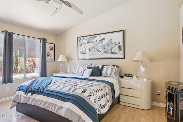 3133 E Redwood Ct, Phoenix, AZ 85048 - bedroom with lofted ceiling, light wood-style flooring, and a ceiling fan