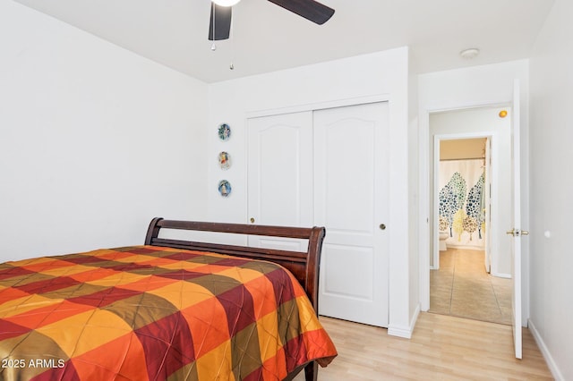 3133 E Redwood Ct, Phoenix, AZ 85048 - bedroom with a closet, light wood-type flooring, and a ceiling fan