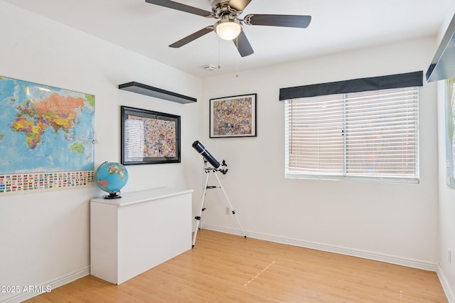 3133 E Redwood Ct, Phoenix, AZ 85048 - unfurnished office with light wood-style floors and a ceiling fan