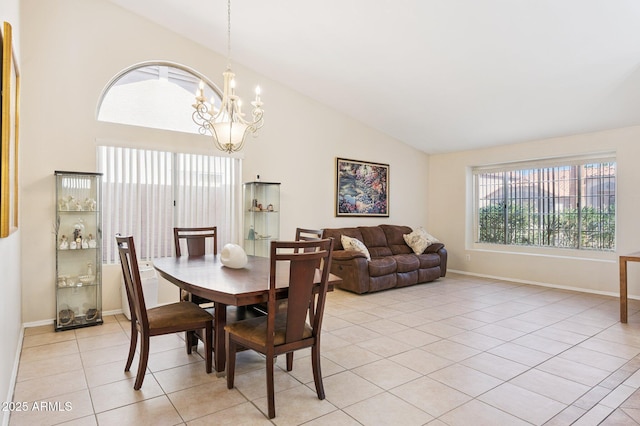 3133 E Redwood Ct, Phoenix, AZ 85048 - dining space featuring a chandelier, light tile patterned flooring, and high vaulted ceiling