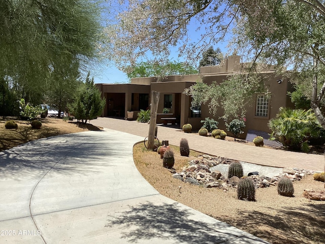 6540 E Wildcat Dr, Cave Creek, AZ 85331 - pueblo-style house with stucco siding